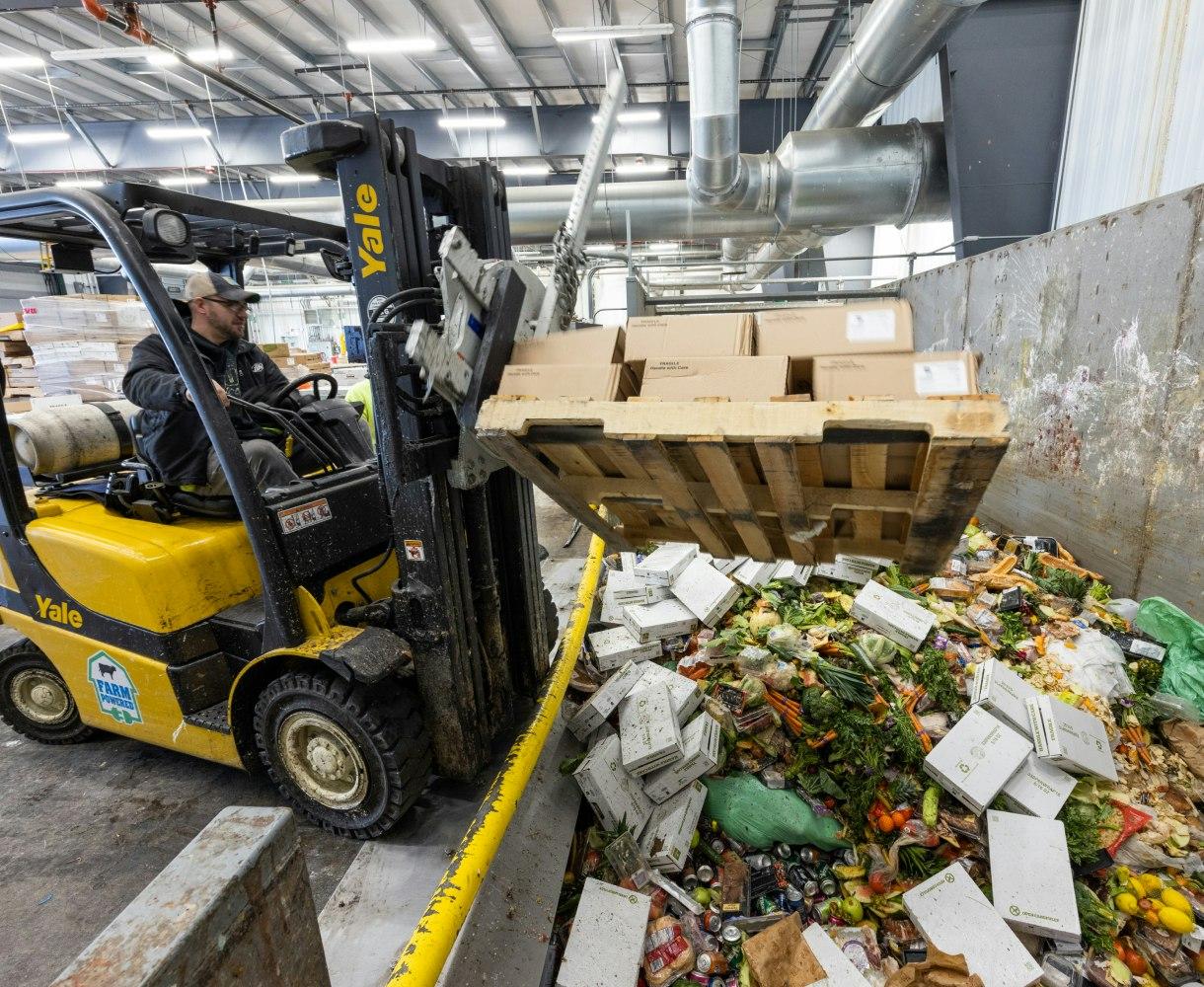 Depackaging waste at a organic waste recycling facility, preparing the food waste for farm powered anaerobic digestion