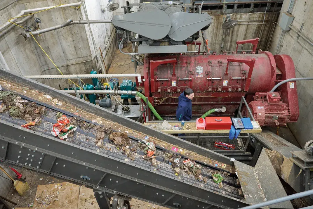 At a Vanguard facility in Agawam, Massachusetts, food waste moves through machines that separate it from packaging and turn it into a slurry. David Degner