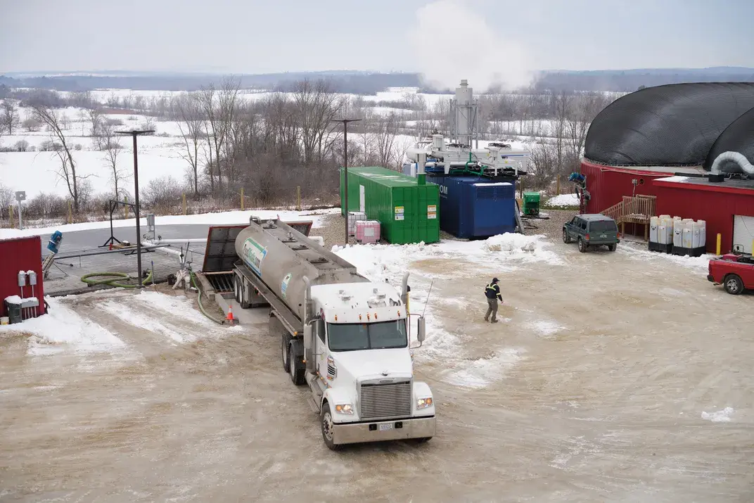 A load of waste material from a milk company, delivered to Goodrich Farm, is poured into the hydrolyzer, the first step in the digestion process. David Degner